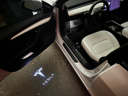 TESLA Door Lights Logo