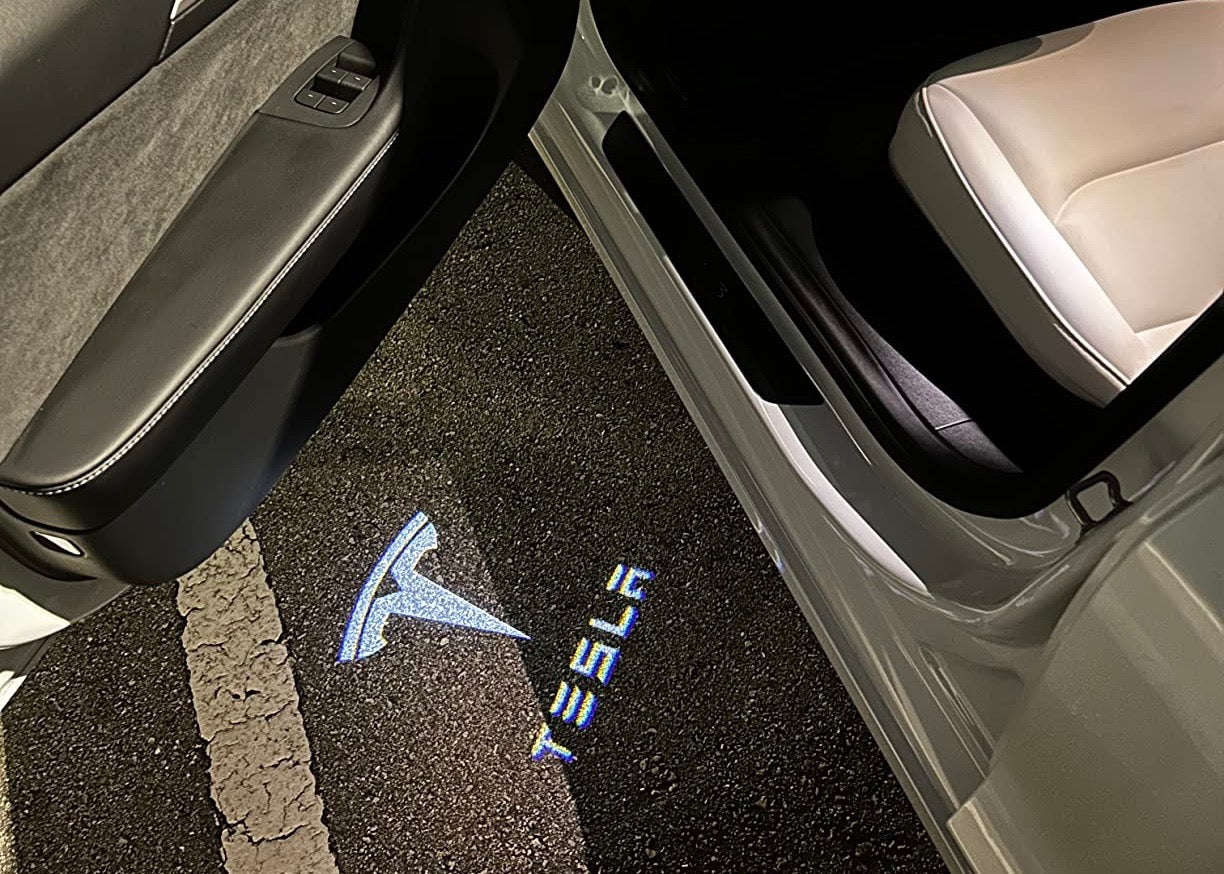 TESLA Door Lights Logo